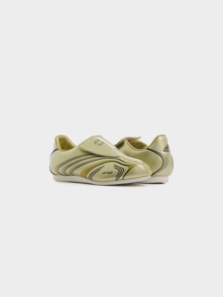 Taekwondo F50 W, Gold Metallic / Core Black